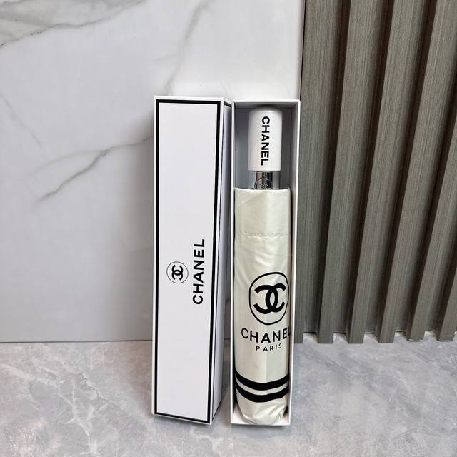 Chanel's new summer fully automatic folding umbrella. Its black coating effectiv