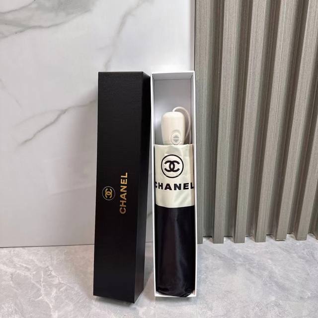 Chanel's new summer fully automatic folding umbrella. Its black coating effectiv