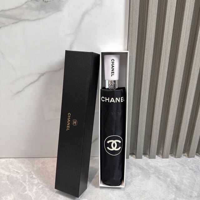 Chanel Airplane new summer fully automatic folding umbrella. Black coating effec
