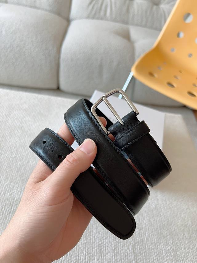 The Row minimalist calfskin belt with visible texture, very versatile; casual pi