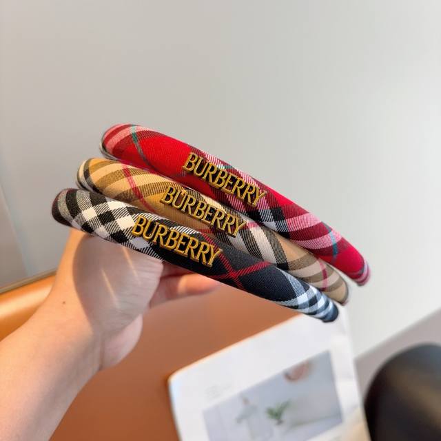 with packaging) Burberry's new tall, narrow plaid headband, made of custom-made