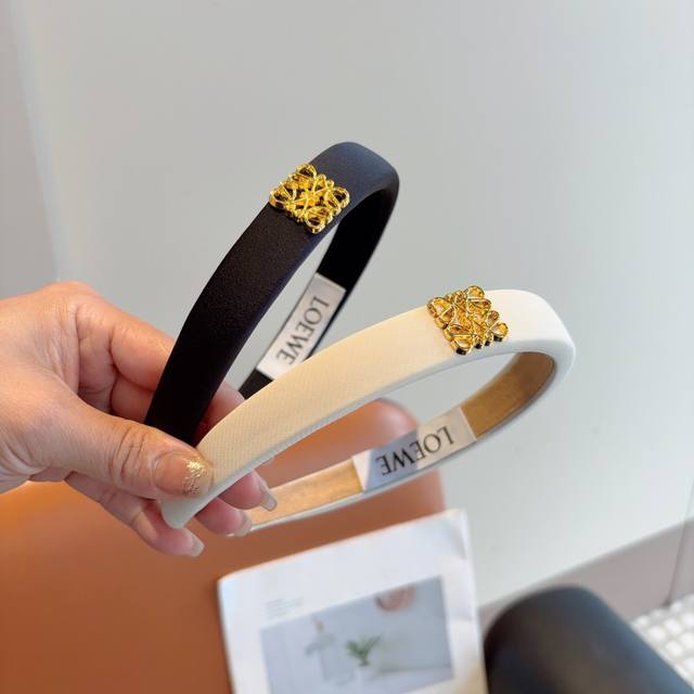 with packaging Loewe's hot new sponge headband, specially made from fabric, is h