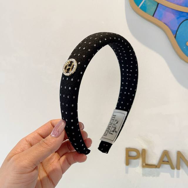 with packaging Hermes' popular custom headband, the same imported fabric as the