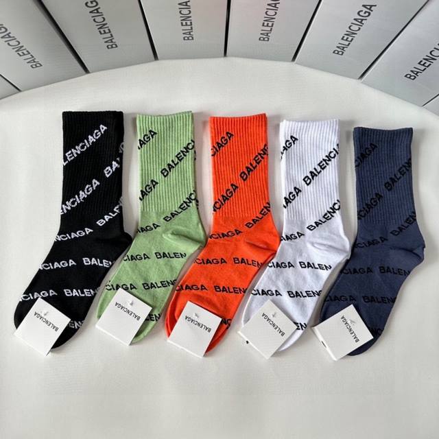 Balenciaga's new mid-length stacked socks are available in exclusive counter pac