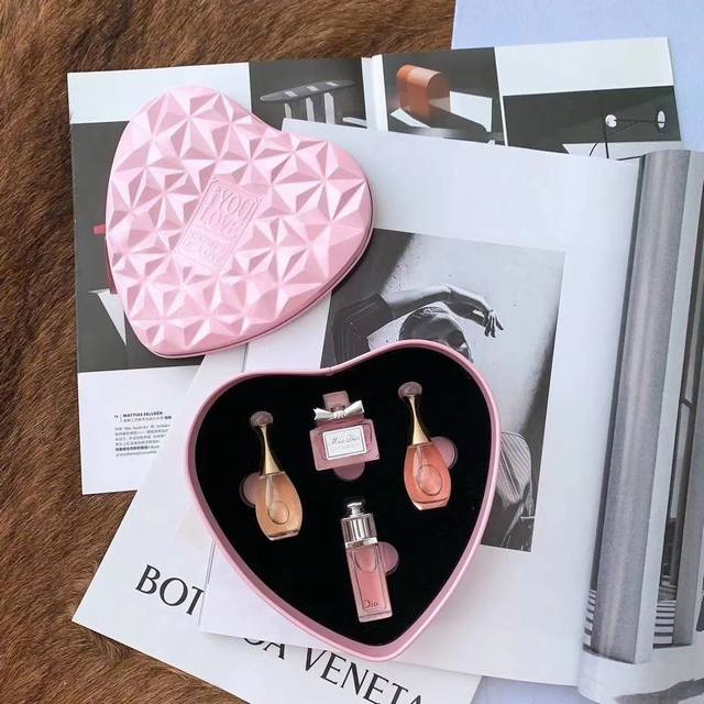 This limited-edition Dior perfume set, packaged in a heart-shaped iron box, feat
