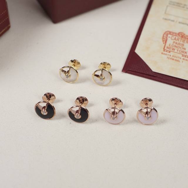 Amulette De Cartier Collection Cartier Amulet Earrings, Z 28300, purchased from