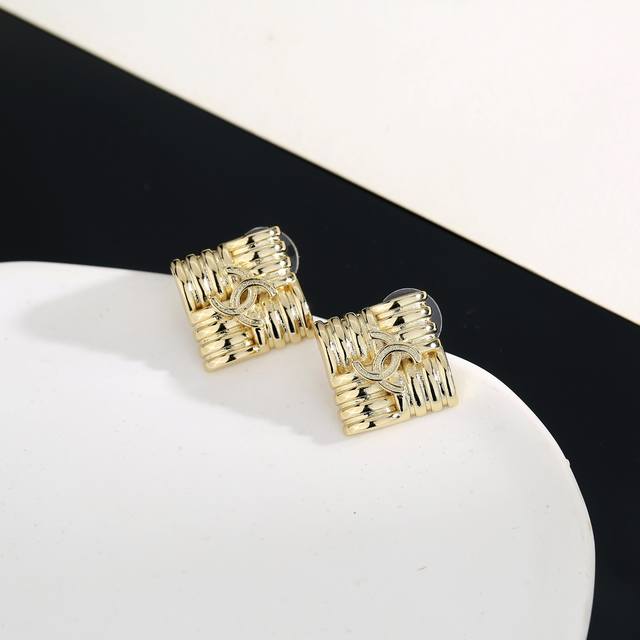 Chanel diamond-shaped earrings are perfect for flattering your face. Surrounded