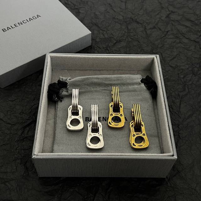 Balenciaga earrings are simple and elegant with rich gold texture, and look grea