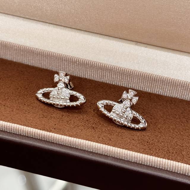A6516 Popular Vivienne Saturn Planet Earrings. What's a must-have for women with