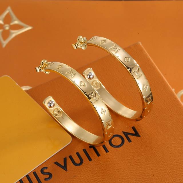 Louis Vuitton letter earrings, crafted with exquisite craftsmanship and polished