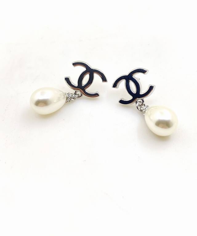 Chanel latest platinum Cc pearl drop earrings consistent with the Z batch brass