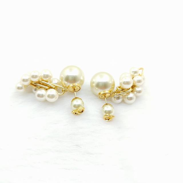 Daor latest model large and small pearls and multiple pearl earrings consistent