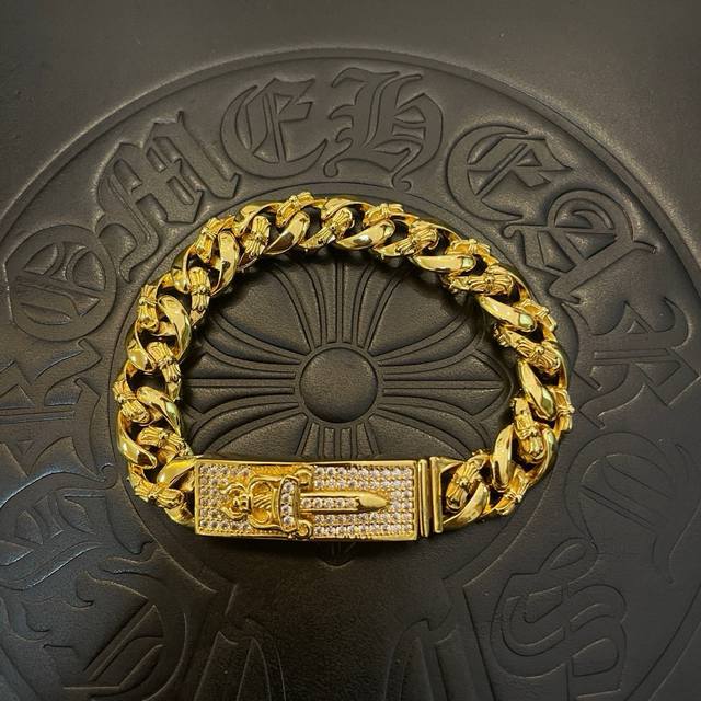 a counter-quality Chrome Hearts gold-tone classic half-flower cross, twisted swo