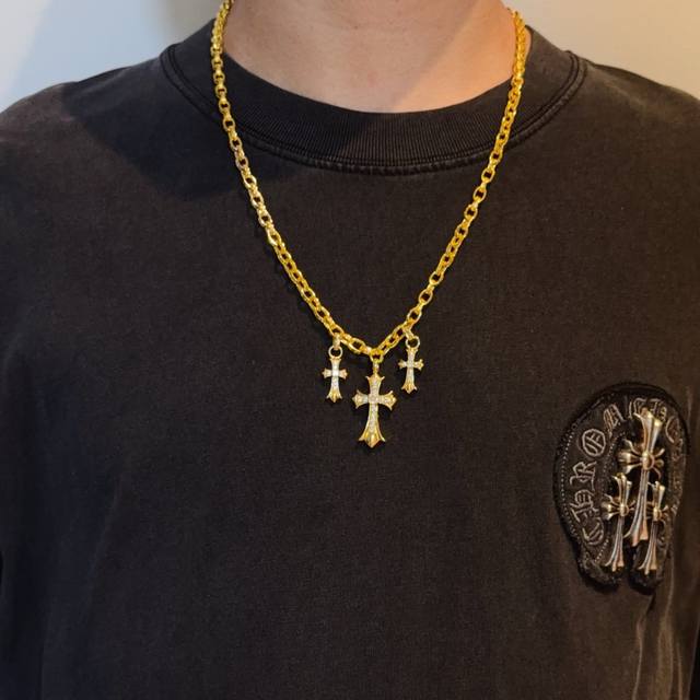 New, counter-quality Chrome Hearts gold cross necklace. The concave and convex s