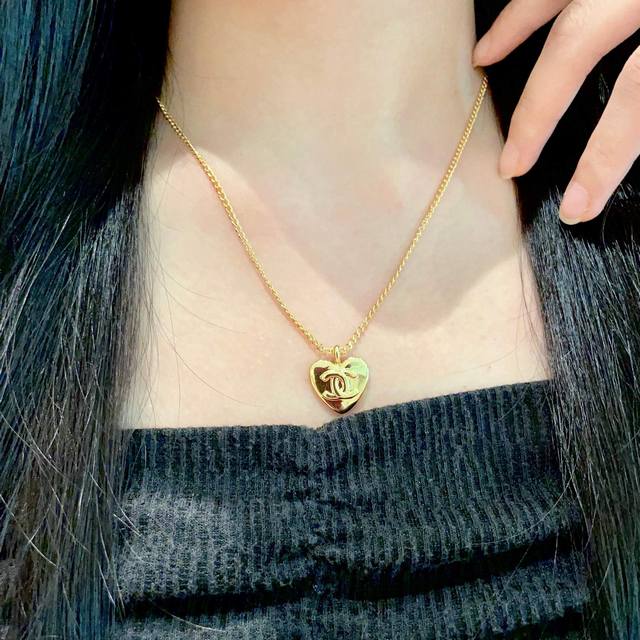 Chanel vintage letter necklace. Chanel's styles really need no introduction. Eac