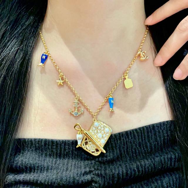 Chanel vintage letter sweater necklace. Chanel's styles really need no introduct