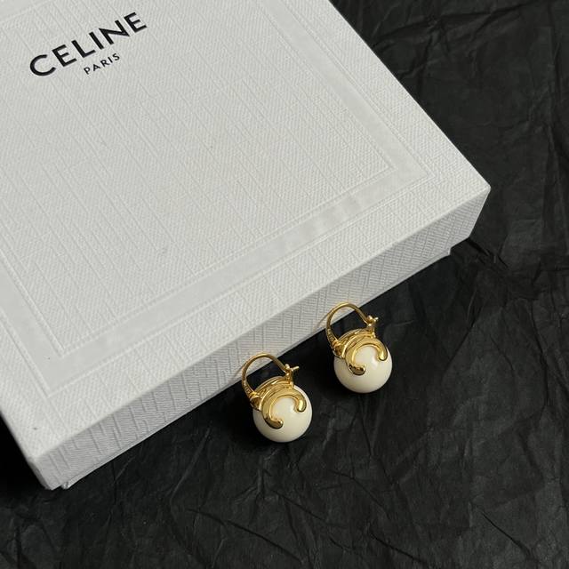 Celine earrings have always been the benchmark of minimalist fashion. Their bold