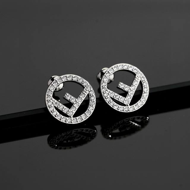 Fendi classic Fendi lettering earrings, original and 18K gold plated, counter-on
