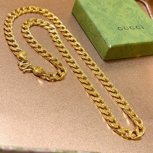 The latest Gucci necklace, featuring a higher-end chain and a celebrity-themed l