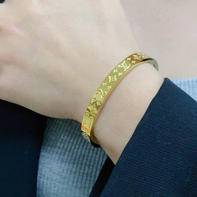 New, original, narrow, engraved Louis Vuitton logo bracelet. Made from the same