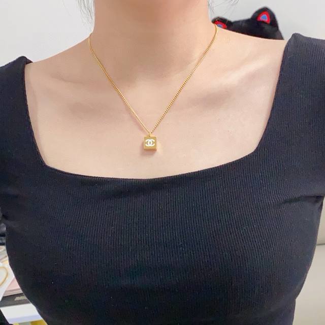 Chanel's latest double C thick gold black and white double-sided necklace square