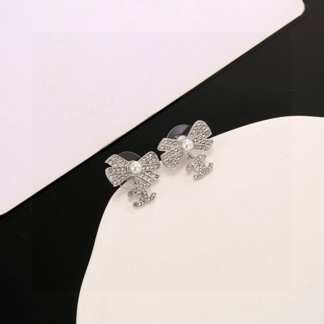 Chanel classic double C bow earrings are very beautiful and versatile with any c