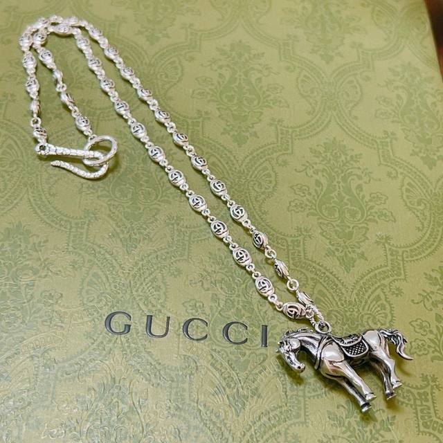 The latest Gucci necklace, featuring a higher-end chain and a celebrity-themed A