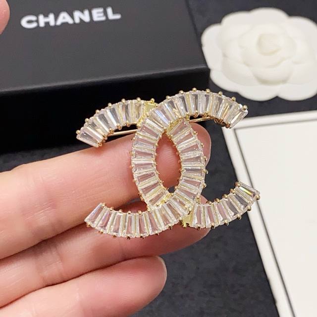 Chanel's new diamond-studded brooch is a truly feminine accessory. Women who hav