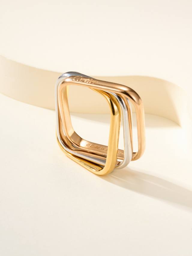 Trinity cushion-shaped tricolor ring echoes Trinity jewelry collection. Each rin