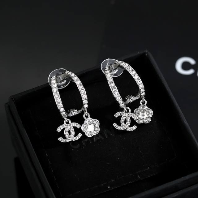 Chanel classic double C flower vase earrings are a great accessory for any style