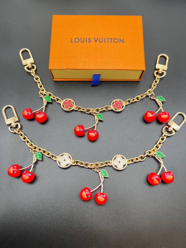 Lv Cherry Bag Chain comes in two packs. gold chain features a cute cherry shape,
