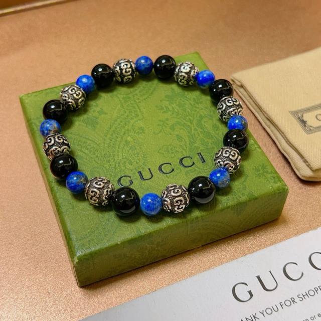 Gucci bracelet, unisex, latest model. Natural black agate with lapis lazuli. Thi