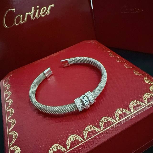 Silver Cartier Love diamond bracelet, a high-end custom version. Diamond-studded