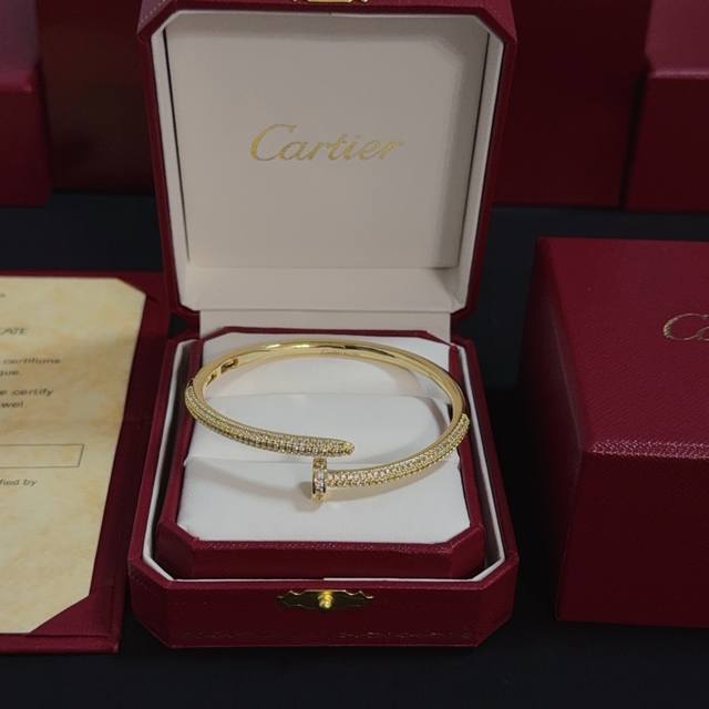 Cartier nail-studded bracelet, a high-end custom version, inlaid with diamonds.