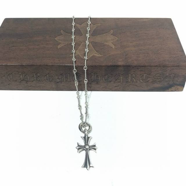a premium Chrome Hearts classic retro bamboo cross necklace. The concave and con