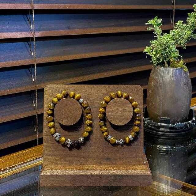 a premium Chrome Hearts bracelet featuring classic vintage beads and concave and
