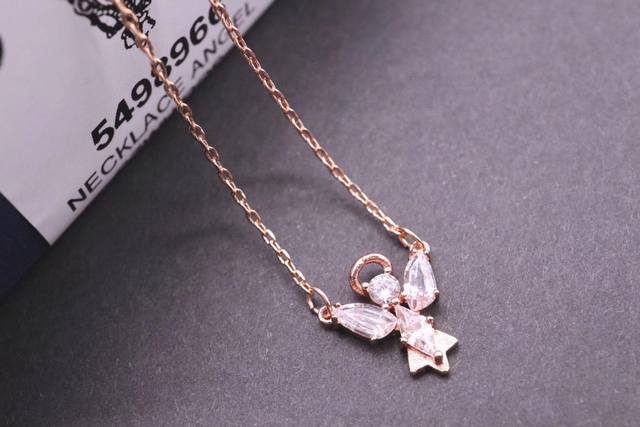 Swarovski Rose Gold Angel Clavicle Necklace This ingenious, angel-shaped rose go