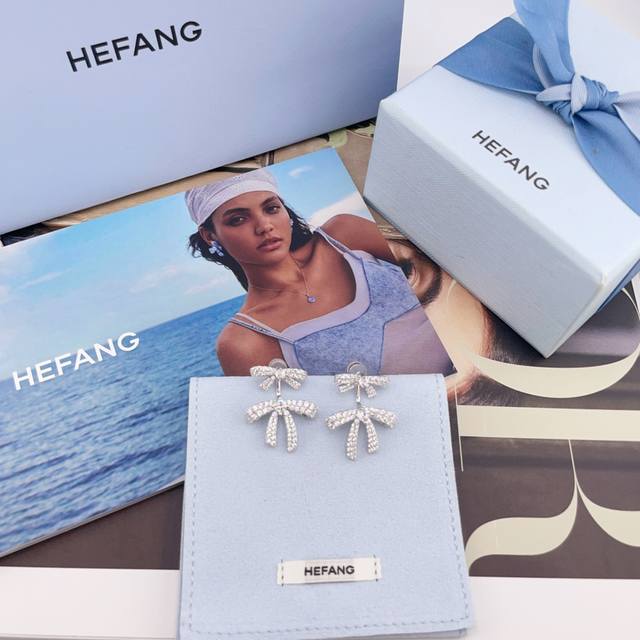 Our Hf Double-Layered Diamond Bow Stud Earrings, Z 1490, are absolutely stunning