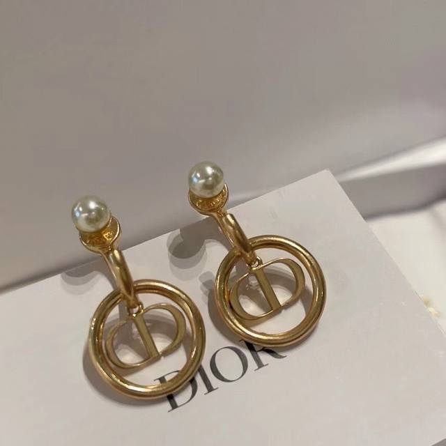 Dior CD rivet earrings, front and back beads, same as the counter brass material