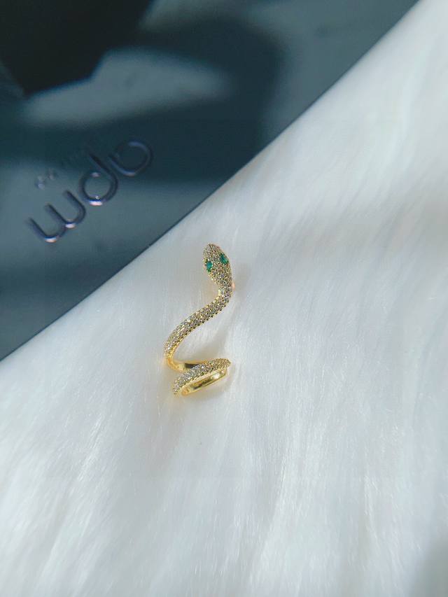 Batch A M Monaco platinum snake and gold snake ear clips are a must-have for fas