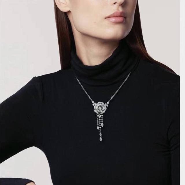 Our camellia necklace is available in custom 18K gold and diamond versions. We o