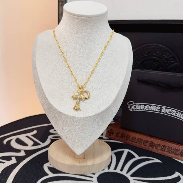 New, counter-quality Chrome Hearts brooch with diamond cross necklace. The conca