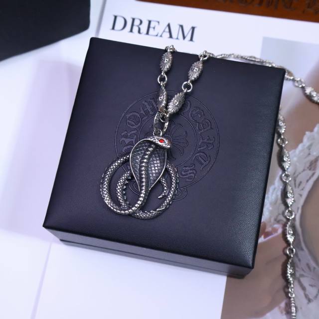 Chrome Hearts handmade chain necklace features a cross and scout flower design,