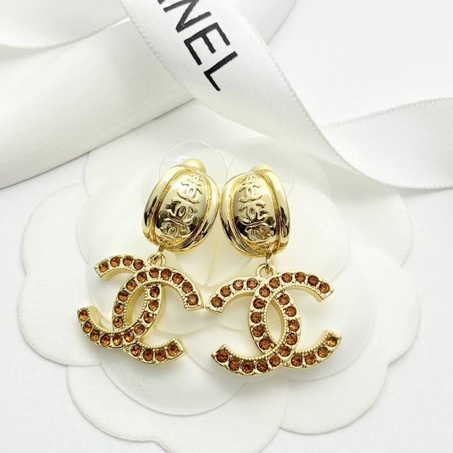 Chanel earrings are a hot seller! These Chanel 25 vintage red-brown rhinestone d