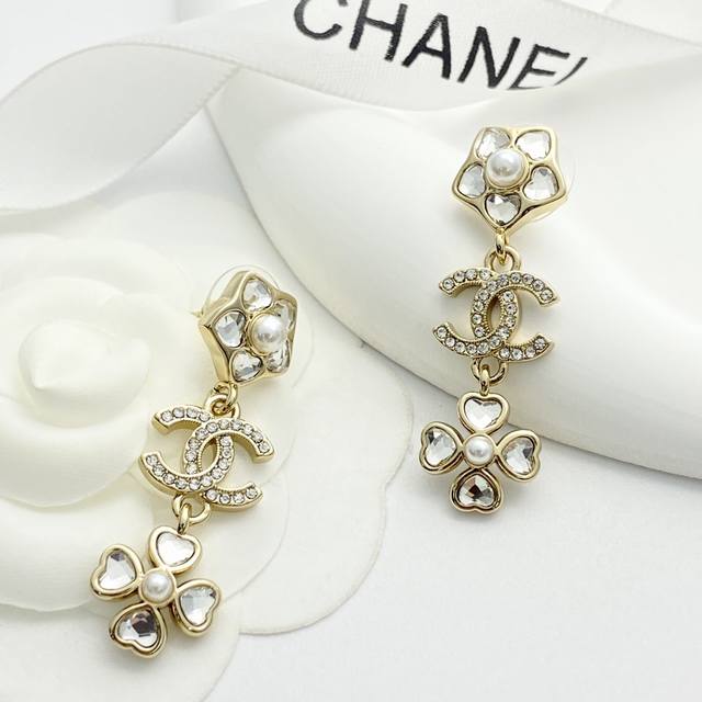 Chanel earrings are a hot seller! The Chanel 25 heart rhinestone flower pendant