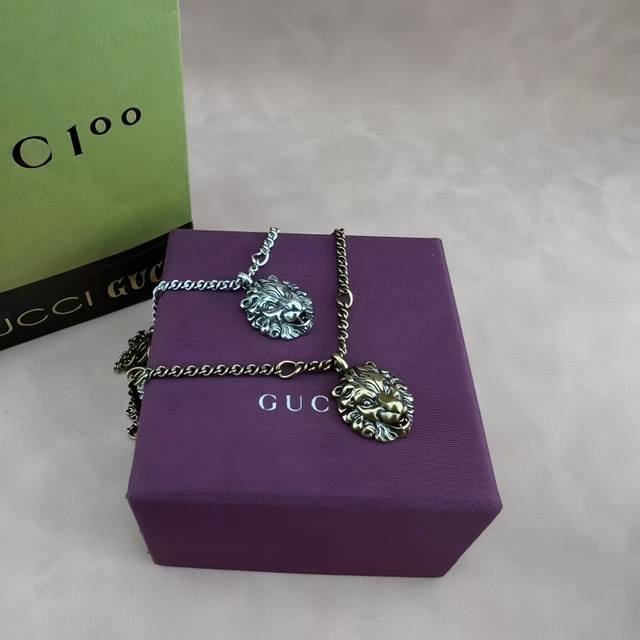 Gucci lion head necklace