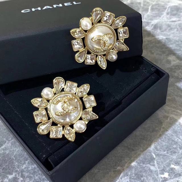 Chanel sunflower earrings are truly stunning. These exaggerated earrings are inc
