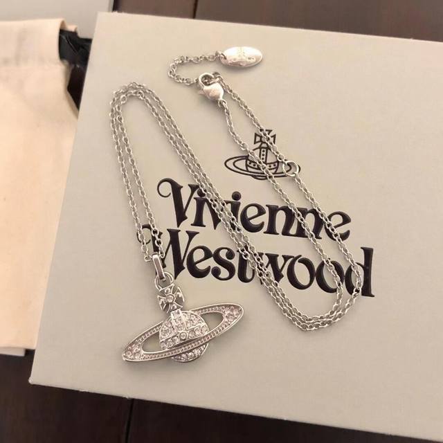 Queen Vivienne Diamond Saturn Necklace - No Need to Miss a Thing! This pure roya