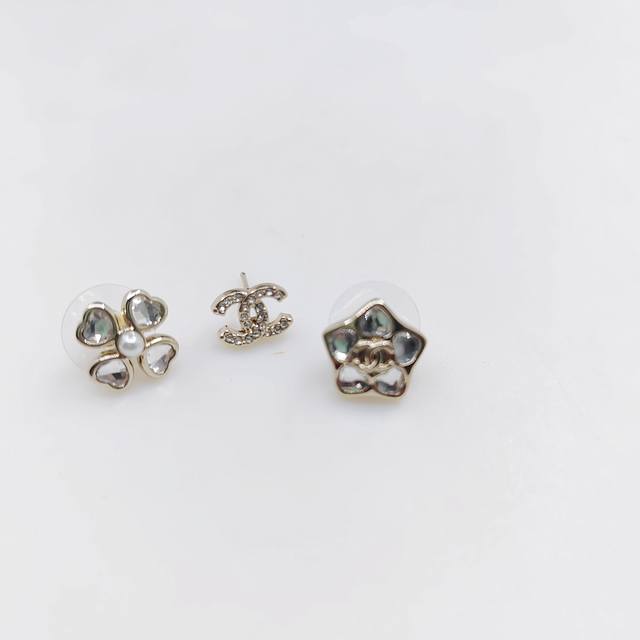 Chanel latest white diamond five-pointed star 3-piece earring set consistent wit