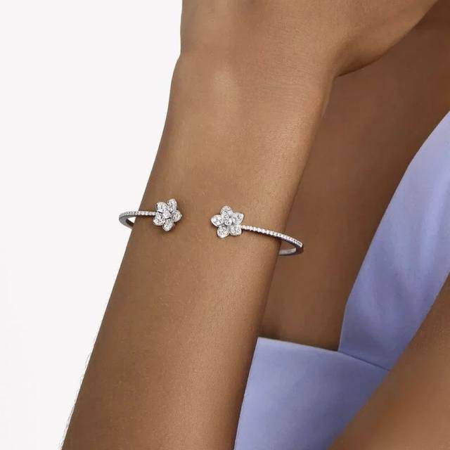 double flower open bracelet is in stock and is hard to come by. It is particular